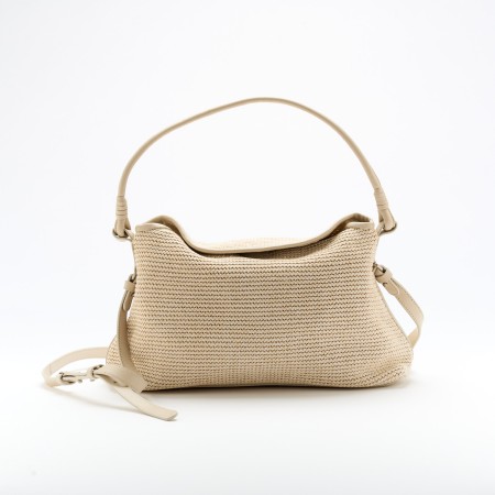 Kristi Desert is a bag made out of sophisticated leather, featuring a smooth and structured design adorned with a tresvelt pather leather on the front and back. Its elegant curved handles provide a comfortable and secure grip, while the contrast tresvelt leather adds a refined and unmatchable touch. With a spacious interior and sturdy construction, this bag is both stylish and practical, perfect for elevating everyday outfits or complementing a chic, formal look as you can wear it with any piece of clothing. The shipping is free in our online store.