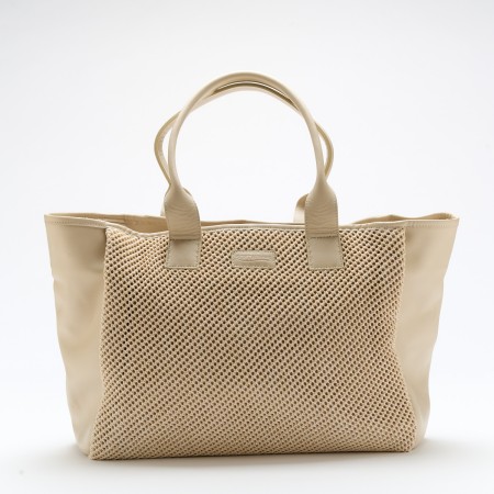 Kimi Noisette is a bag made out of sophisticated leather, featuring a smooth and structured design adorned with a crochet pather leather on the sides. Its elegant curved handles provide a comfortable and secure grip, while the contrast crochet leather adds a refined and unmatchable touch. With a spacious interior and sturdy construction, this bag is both stylish and practical, perfect for elevating everyday outfits or complementing a chic, formal look as you can wear it with any piece of clothing. The shipping is free in our online store.
